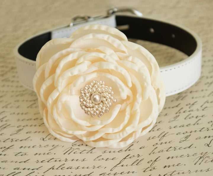 Ivory flower dog collar with layered fabric petals and elegant pearl centerpiece.