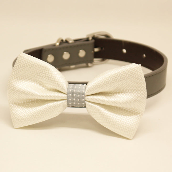 Ivory white dog bow tie collar with textured satin bow tie, gray polka dot center accent, and dark vegan leather collar
