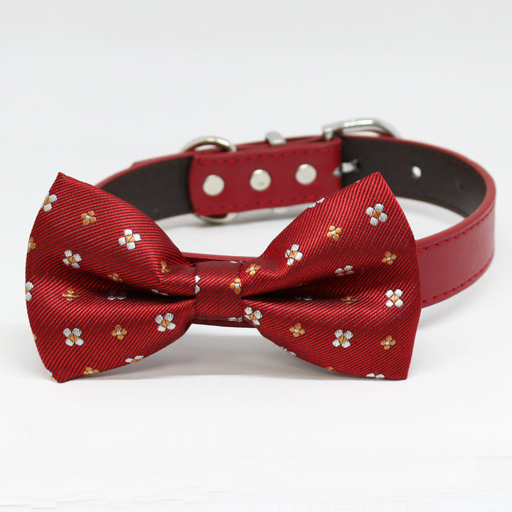 Red micro floral pattern dog bow tie attached to a red vegan leather dog collar.