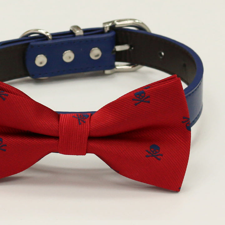 Red dog bow tie collar with navy skull pattern and blue vegan leather collar.