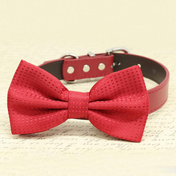 Red textured dog bow tie collar with subtle dot pattern and red vegan leather collar.