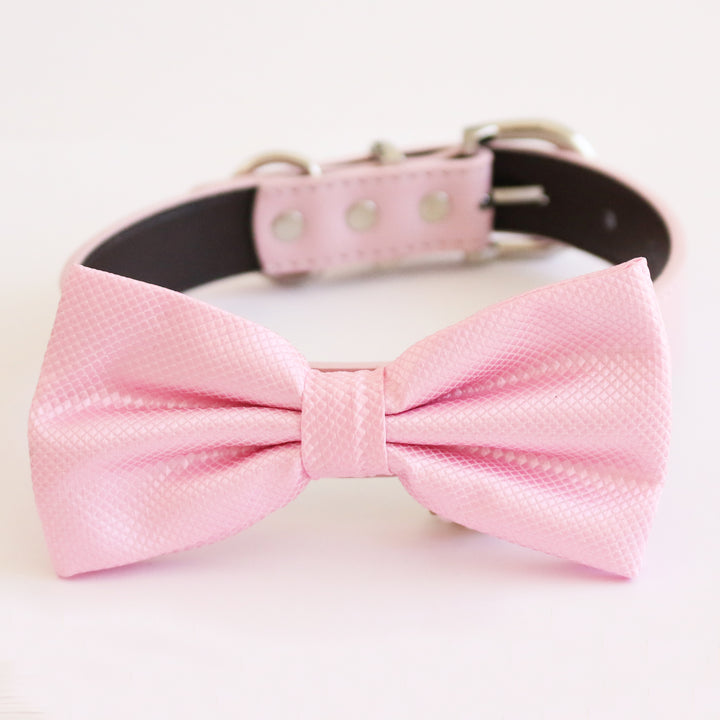 Soft pink textured satin dog bow tie attached to an adjustable collar.