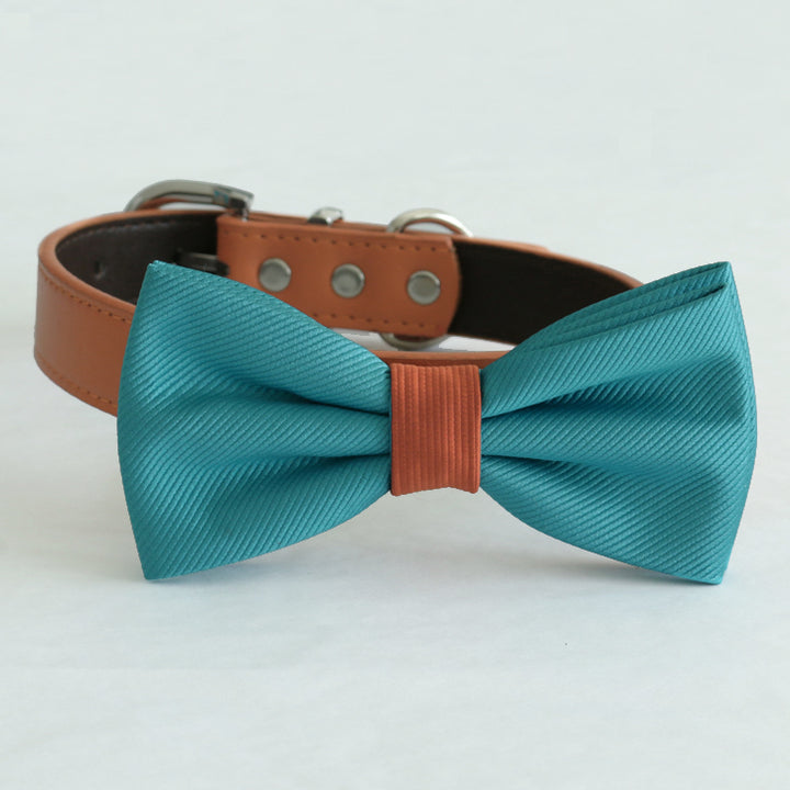 Teal blue satin dog bow tie with cinnamon center accent attached to an adjustable collar.