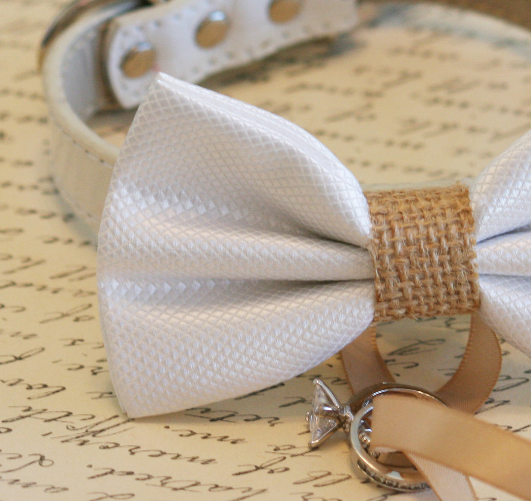 Close-up of a white satin dog bow tie with burlap center accent and ivory vegan leather collar.