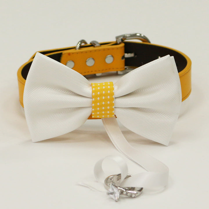 White ring bearer dog bow tie with yellow polka dot center accent attached to a yellow vegan leather collar with wedding ring holder ribbon.