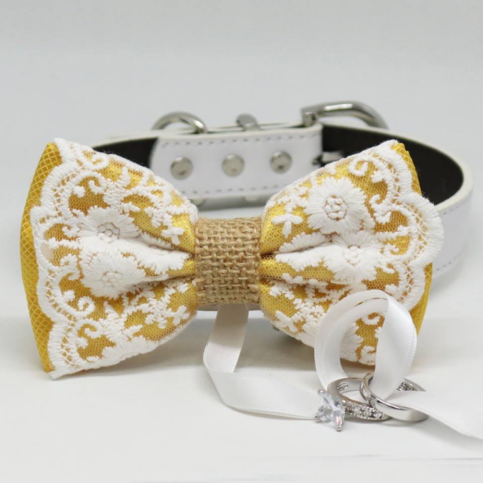 Yellow lace ring bearer dog bow tie collar featuring embroidered floral lace pattern, attached wedding ring holder ribbon, decorative ring set, and adjustable white vegan leather collar for weddings and formal ceremonies